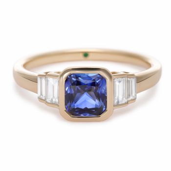 Custom bezel set vintage inspired yellow gold engagement ring square octagonal blue sapphire with tiered baguette diamond side stones five stone